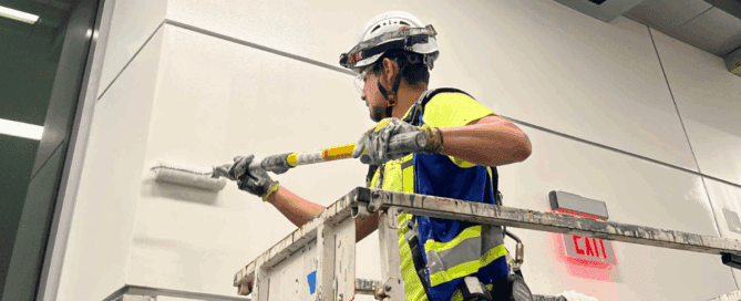 On Site with Socium: A Day in the Life of a Superintendent - A team member painting a wall