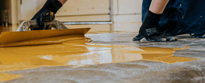 Industrial Floor Coatings: Balancing Durability and Safety - Floor Coating Being Applied