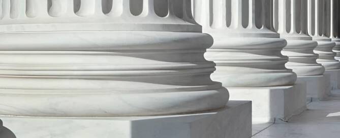Federal building columns with durable coating systems applied for long-term protection and compliance
