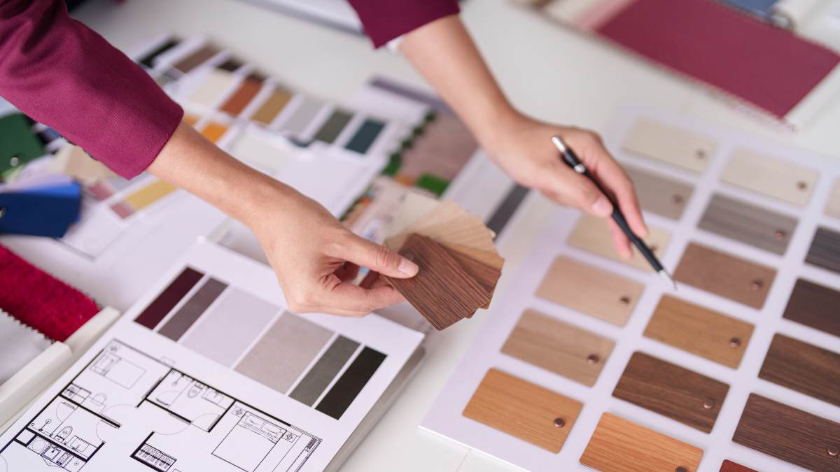Professional painter selecting commercial building colors for an office building project