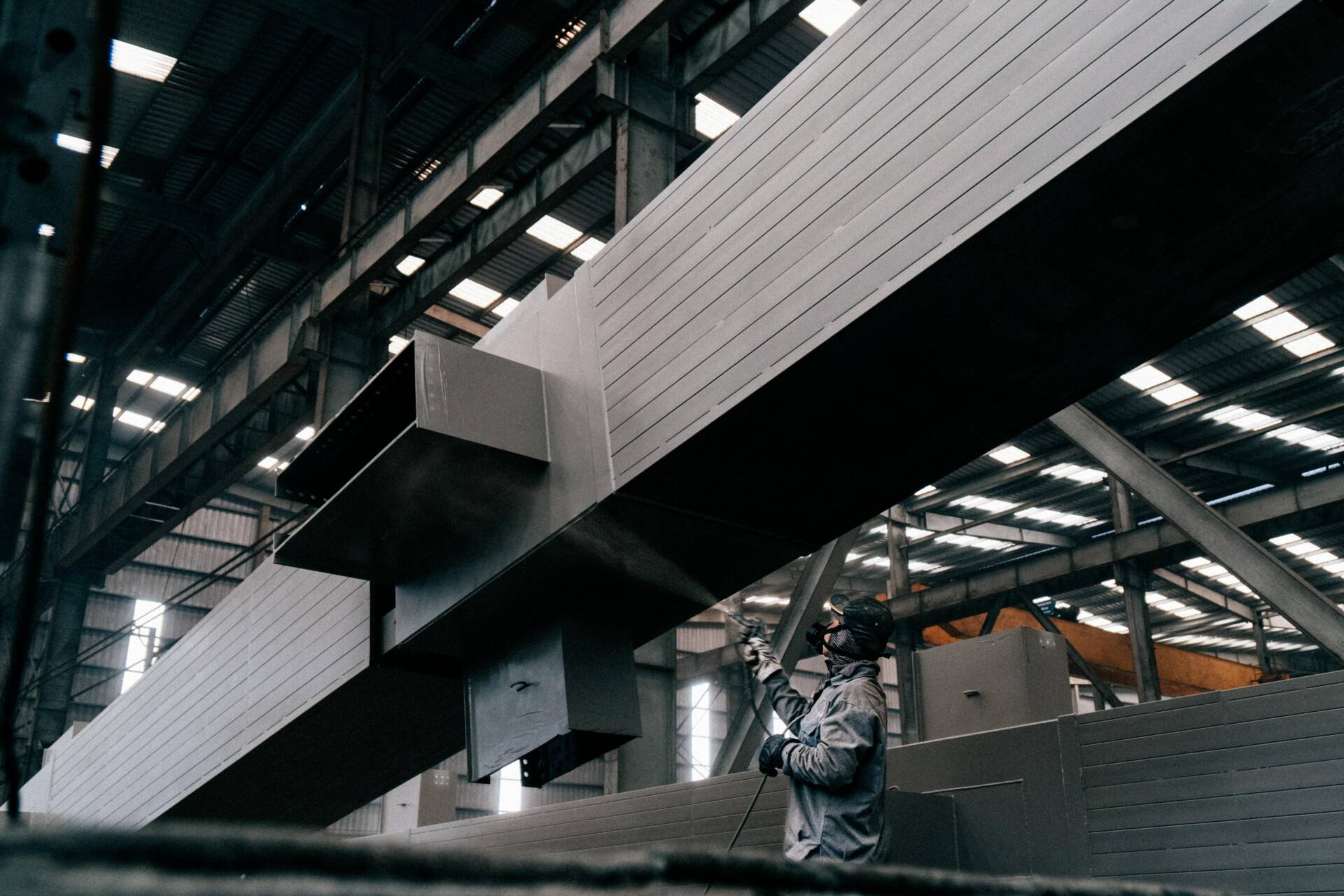Industrial painting contractor working in an industrial facility