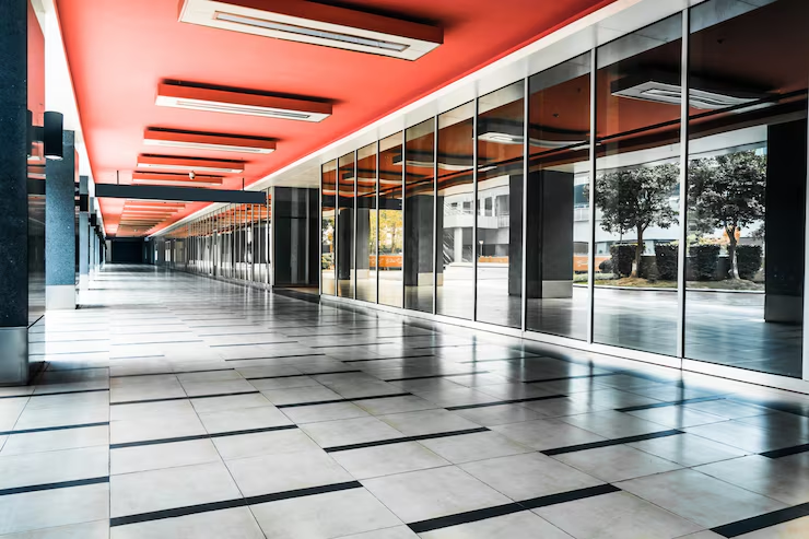 Modern commercial building corridor featuring a bold painted ceiling 