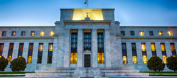 Federal building exterior lit up in the evening