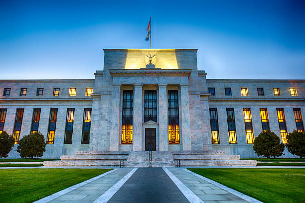 Federal building exterior lit up in the evening