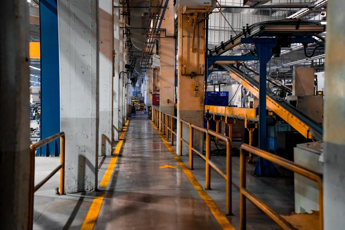 Industrial factory interior with protective coatings