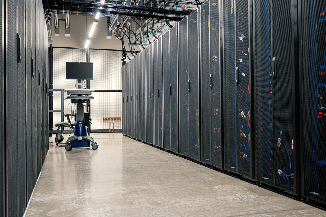 Data centre with servers stacked and floors protected by coatings