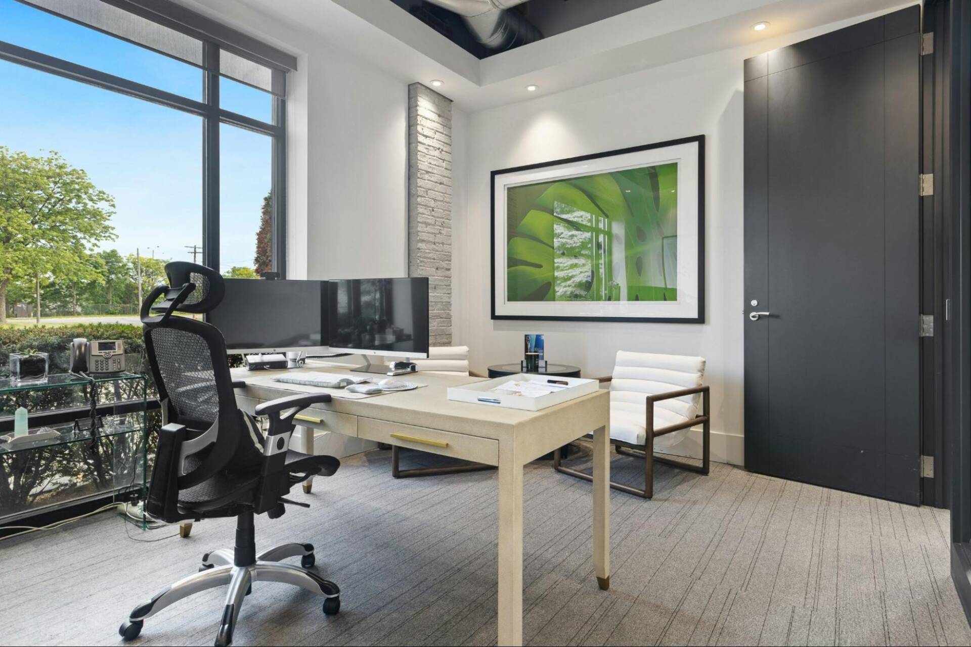 Office painters refreshing the interior walls of a modern commercial workspace in Georgia